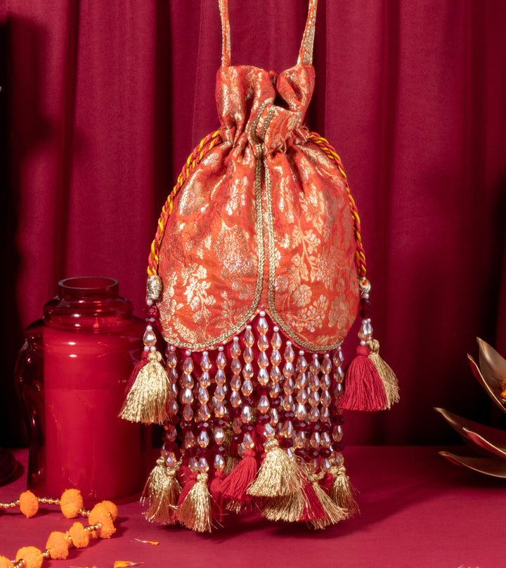 Orange Meera Tasseled Potli - Suave Bags